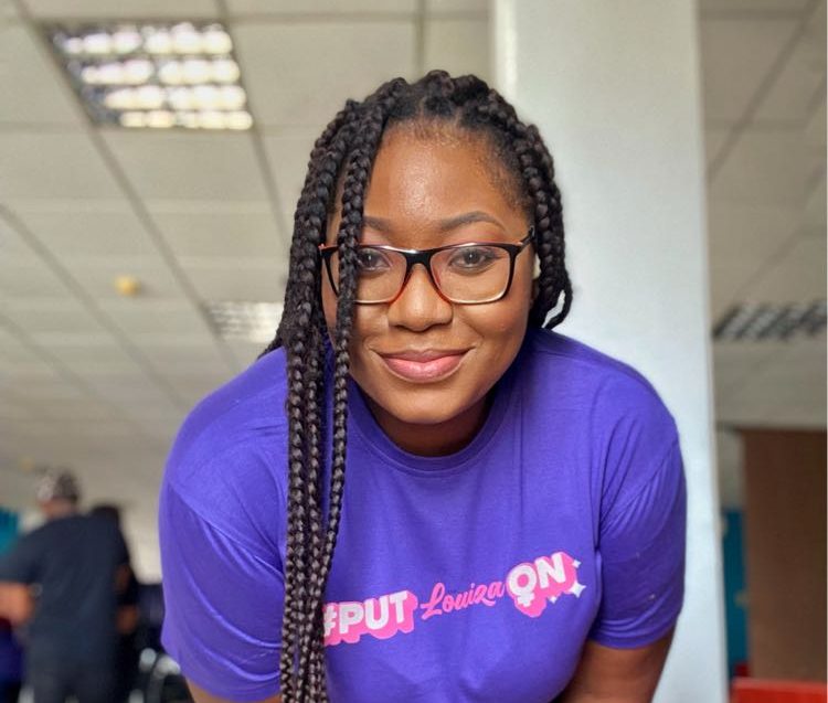 Portrait of a creator wearing a purple campaign T-shirt